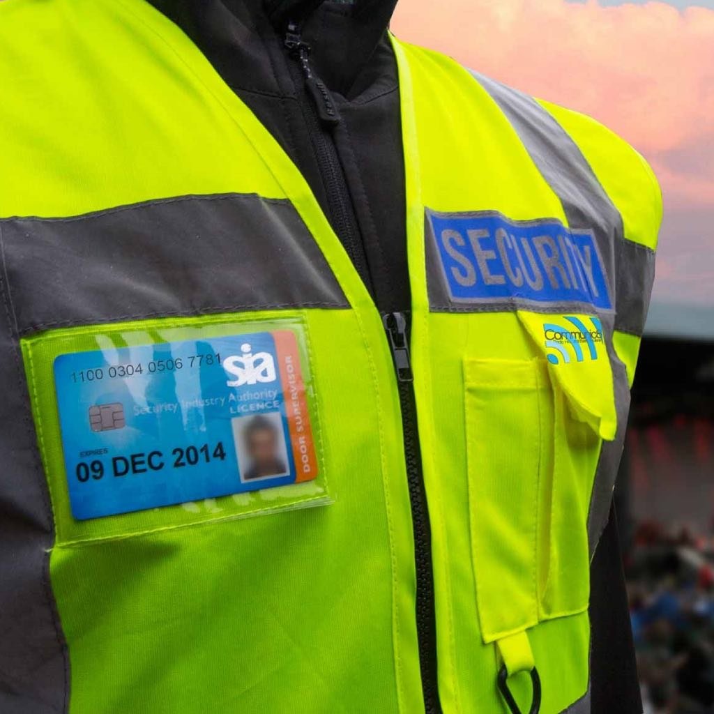 Security guard wearing a Hi visibilty jacket